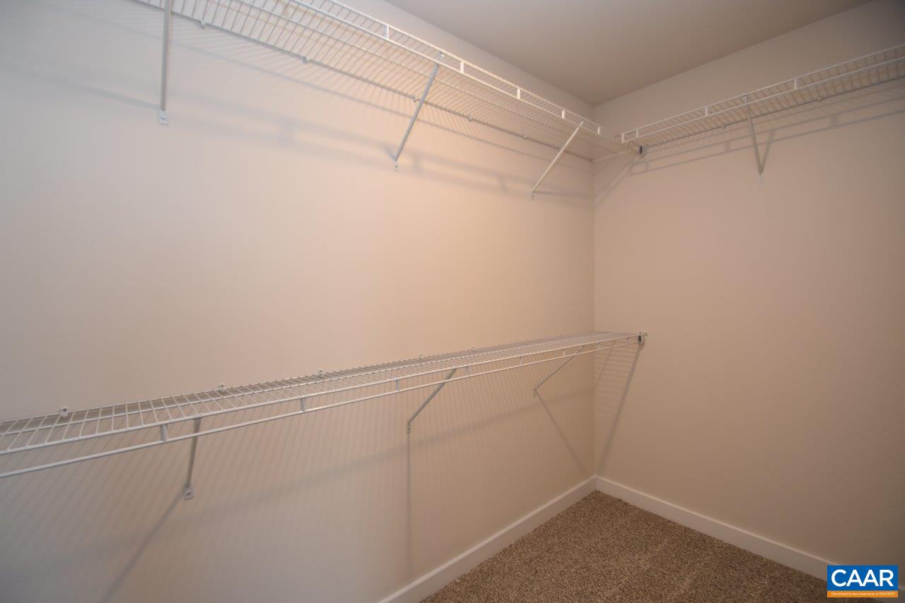 0 Lake Road, Unit HL12A Troy, VA 22974 - Photo 28 of 36 a view of a room with racks on the wall
