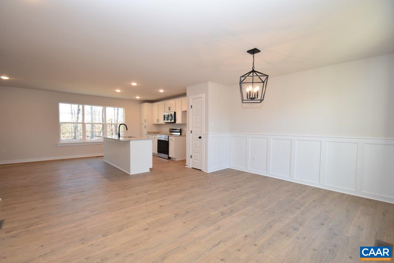 0 Lake Road, Unit HL12A Troy, VA 22974 - Photo 9 of 36 a view of a big room with wooden floor windows and fireplace