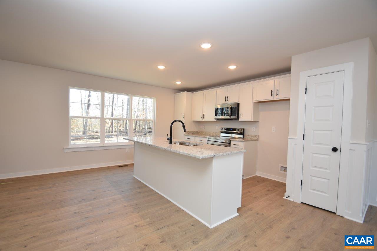 0 Lake Road, Unit HL12A Troy, VA 22974 - Photo 10 of 36 a kitchen with white cabinets and sink