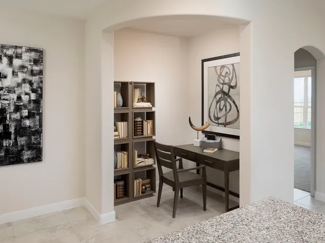 a view of a workspace with furniture