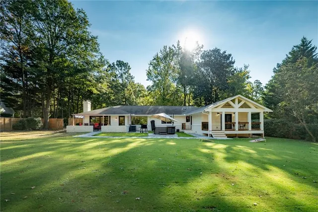 a view of a house with a big yard