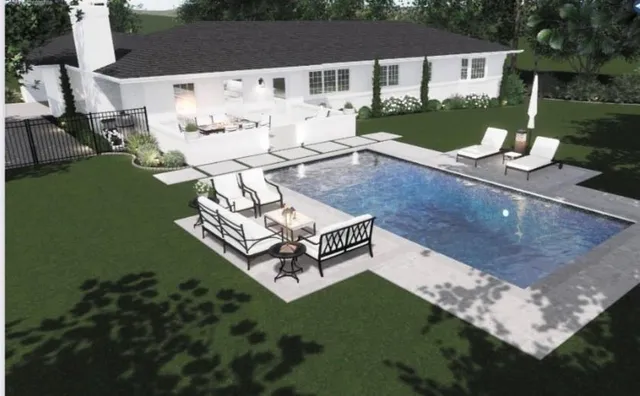 a view of a house with backyard porch and outdoor seating