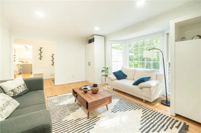 a living room with furniture and a table
