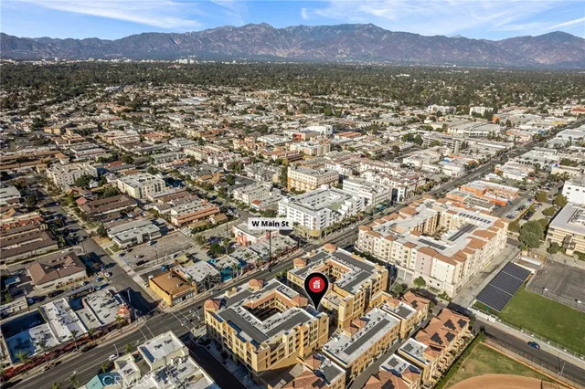 a view of a city with a lake