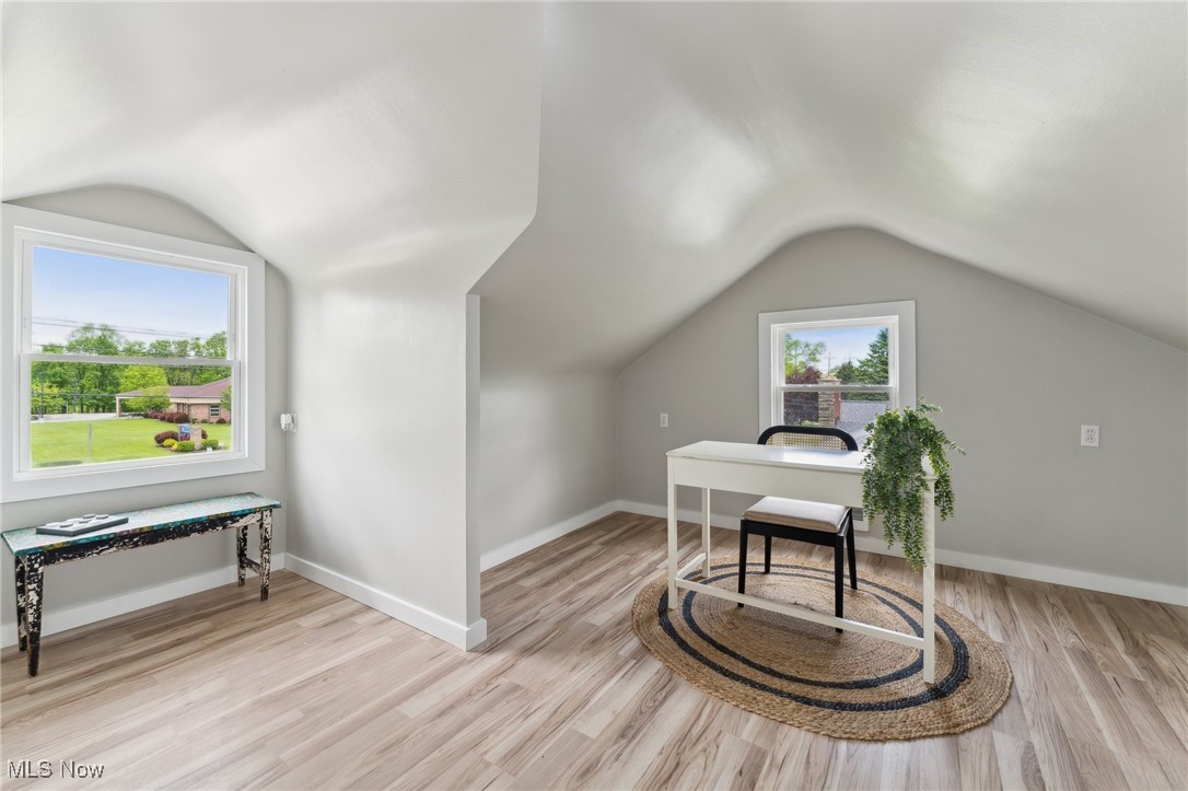 13225 Bagley Road Cleveland, OH 44130 - Photo 25 of 50 Home office featuring vaulted ceiling, light wood finished floors, and baseboards
