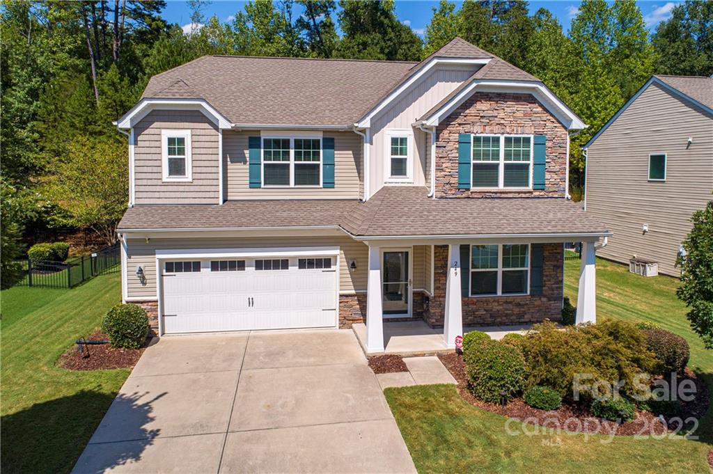 249 Catoctin Road Rock Hill, SC 29732 - Photo 1 of 30 a front view of a house with a yard and garage