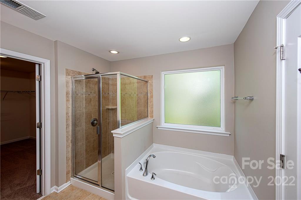 249 Catoctin Road Rock Hill, SC 29732 - Photo 24 of 30 a bathroom with a bathtub and a shower