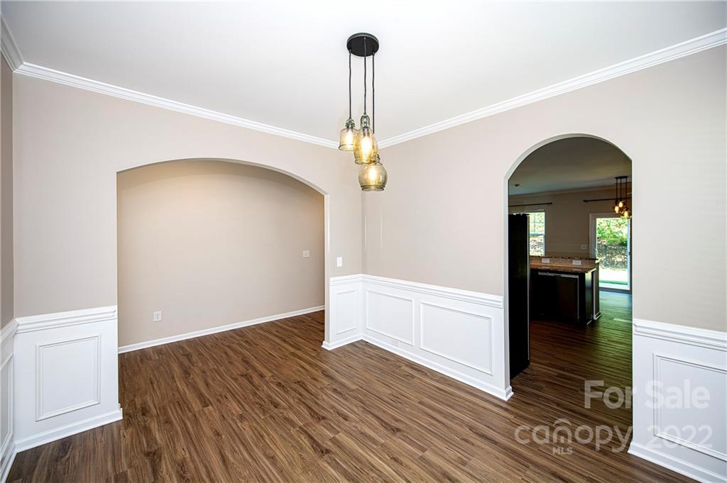 249 Catoctin Road Rock Hill, SC 29732 - Photo 7 of 30 a view of a hallway view with wooden floor and staircase
