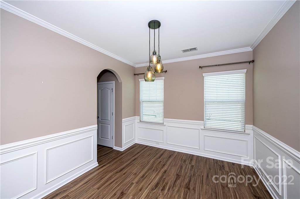 249 Catoctin Road Rock Hill, SC 29732 - Photo 8 of 30 a view of empty room with wooden floor and fan