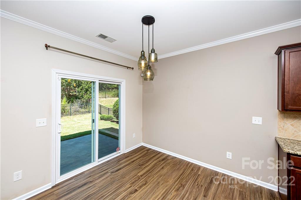 249 Catoctin Road Rock Hill, SC 29732 - Photo 10 of 30 a view of empty room with wooden floor and fan