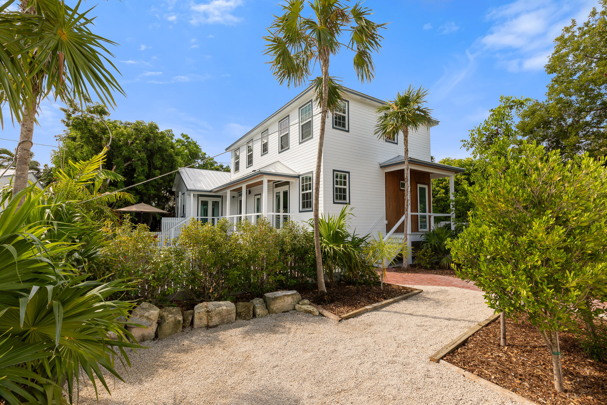 2214 Seidenberg Avenue Key West, FL 33040 - Photo 2 of 37 a view of a house with balcony