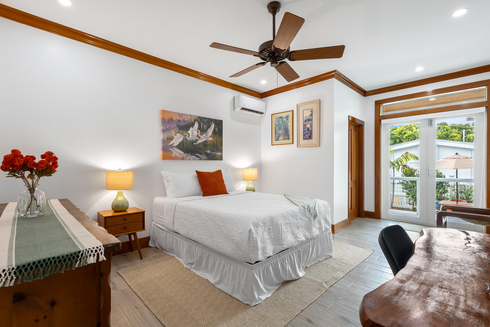 2214 Seidenberg Avenue Key West, FL 33040 - Photo 25 of 37 a bedroom with a bed and a couch