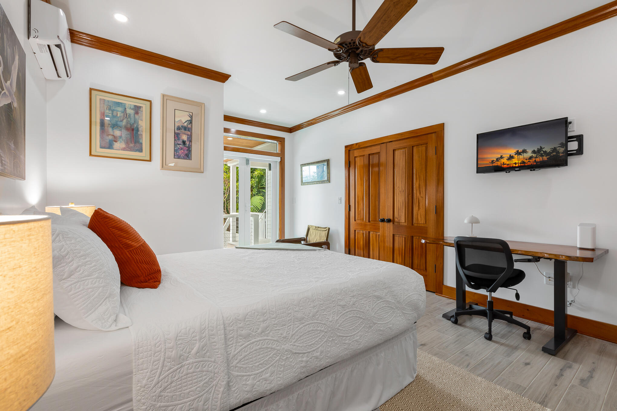 2214 Seidenberg Avenue Key West, FL 33040 - Photo 26 of 37 a bedroom with a bed a chair and a chandelier