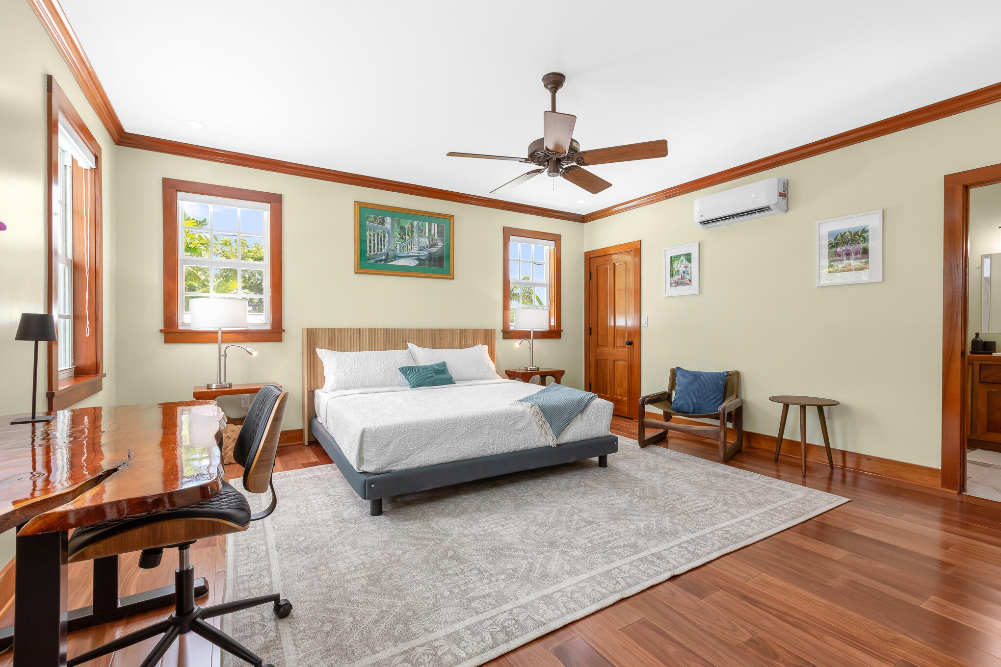 2214 Seidenberg Avenue Key West, FL 33040 - Photo 32 of 37 a bedroom with a bed a table and chair