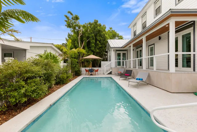 a view of a house with a swimming pool