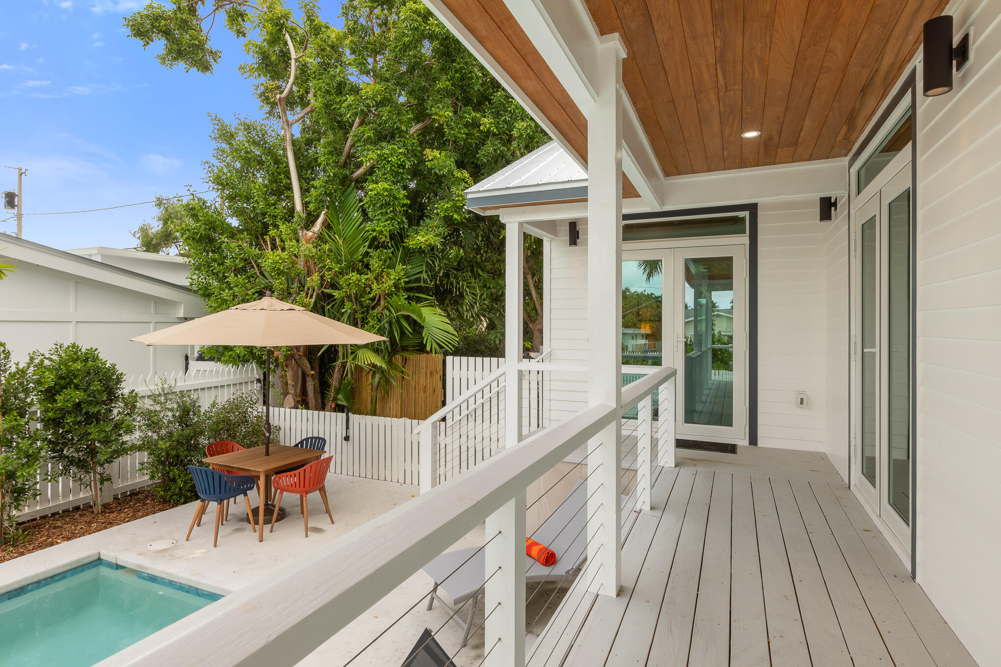 2214 Seidenberg Avenue Key West, FL 33040 - Photo 10 of 37 a view of a patio with a table and chairs