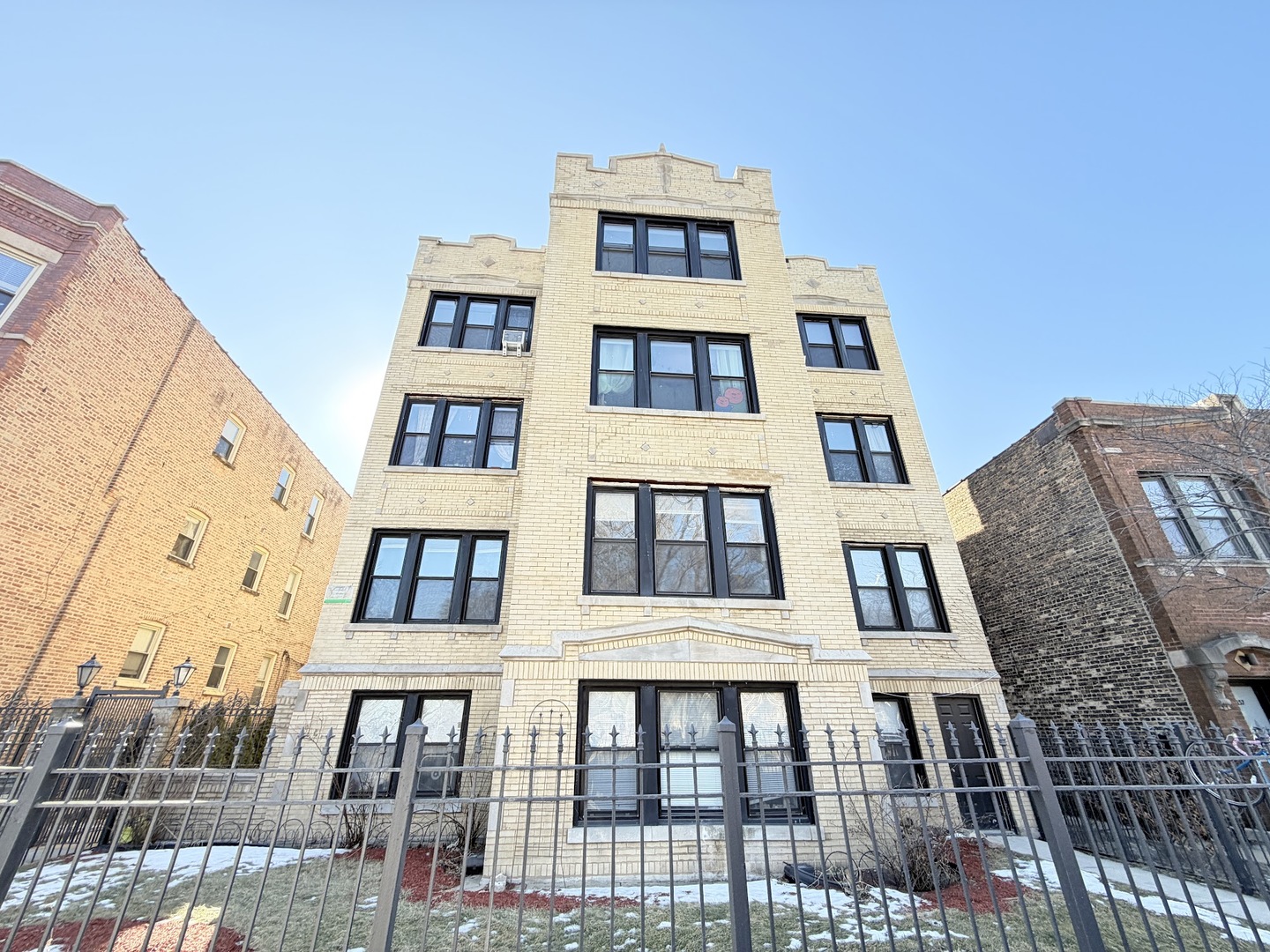 3153 West Augusta Boulevard, Unit 3B Chicago, IL 60622 - Photo 1 of 12 a front view of a multi story building
