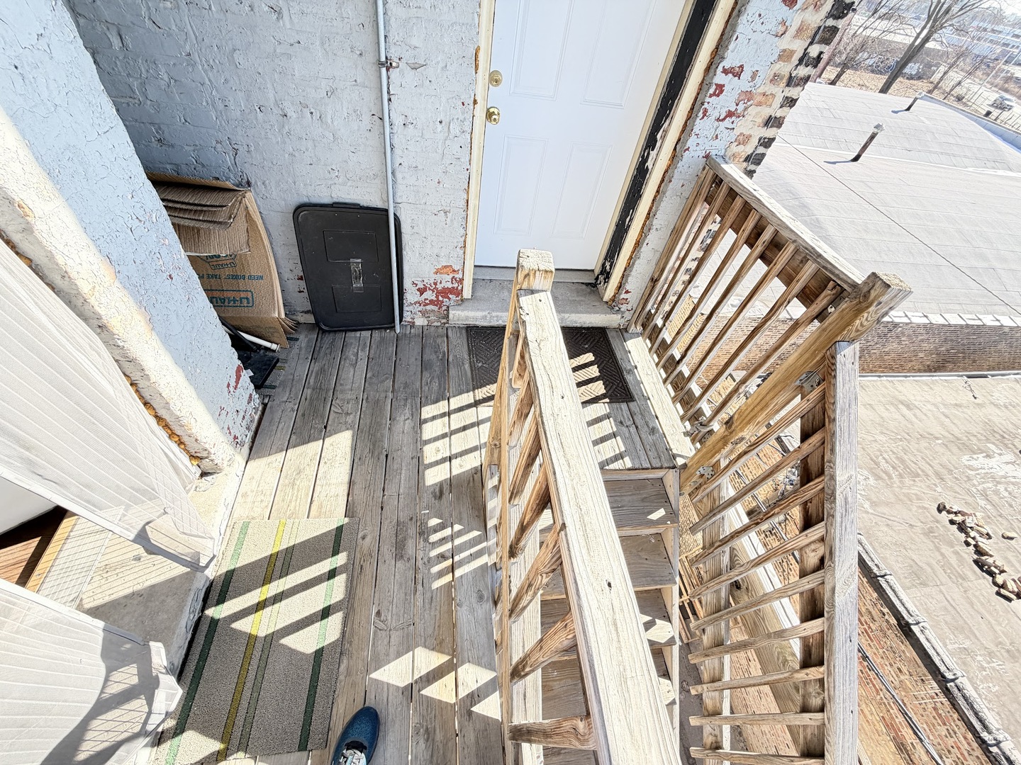 3153 West Augusta Boulevard, Unit 3B Chicago, IL 60622 - Photo 11 of 12 a view of balcony and couch