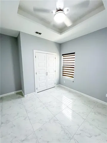 a kitchen with a sink and stainless steel appliances