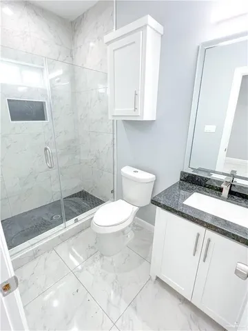 swimming pool view with a garden and plants