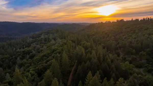 a view of a city with mountains in the background