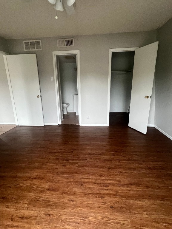 311 East 31st Street, Unit 308 Austin, TX 78705 - Photo 14 of 26 a view of room with window and wooden floor