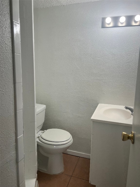 311 East 31st Street, Unit 308 Austin, TX 78705 - Photo 15 of 26 a white toilet sitting next to a white walls