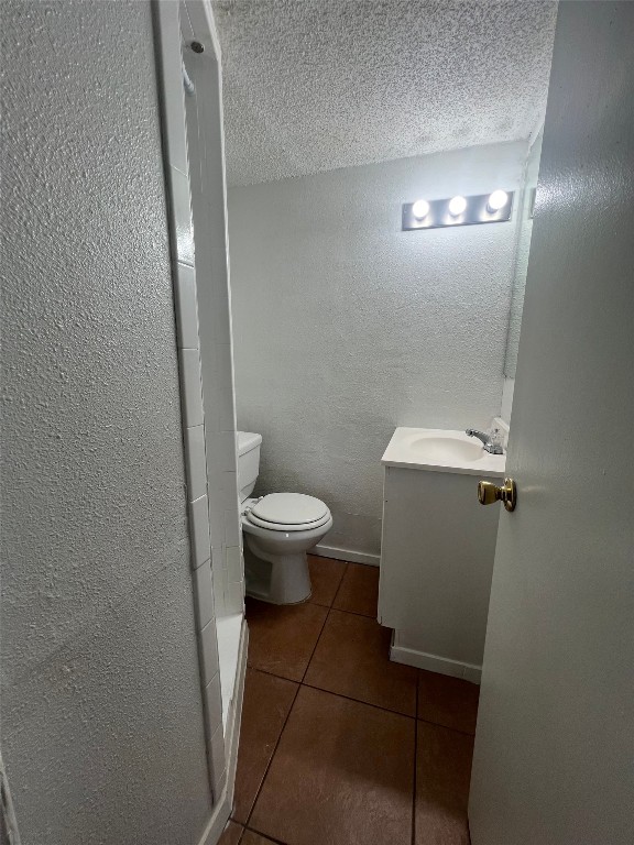 311 East 31st Street, Unit 308 Austin, TX 78705 - Photo 16 of 26 a bathroom with a toilet and a mirror