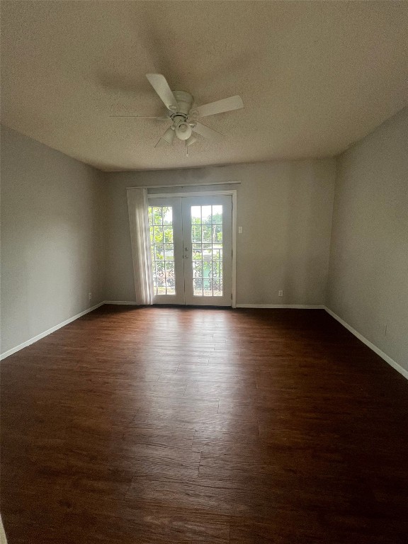 311 East 31st Street, Unit 308 Austin, TX 78705 - Photo 17 of 26 a view of an empty room with wooden floor and a window