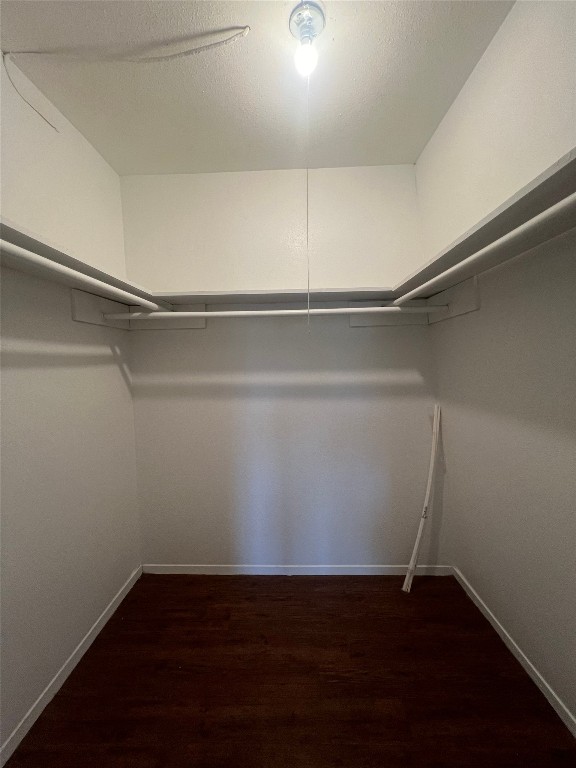 311 East 31st Street, Unit 308 Austin, TX 78705 - Photo 18 of 26 a view of an empty room with wooden floor