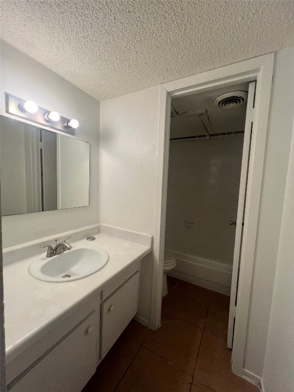 311 East 31st Street, Unit 308 Austin, TX 78705 - Photo 20 of 26 a bathroom with a sink a light fixture a vanity and a mirror
