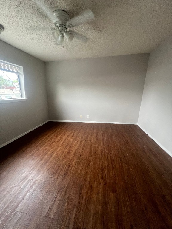 311 East 31st Street, Unit 308 Austin, TX 78705 - Photo 21 of 26 a view of room with hardwood floor and window