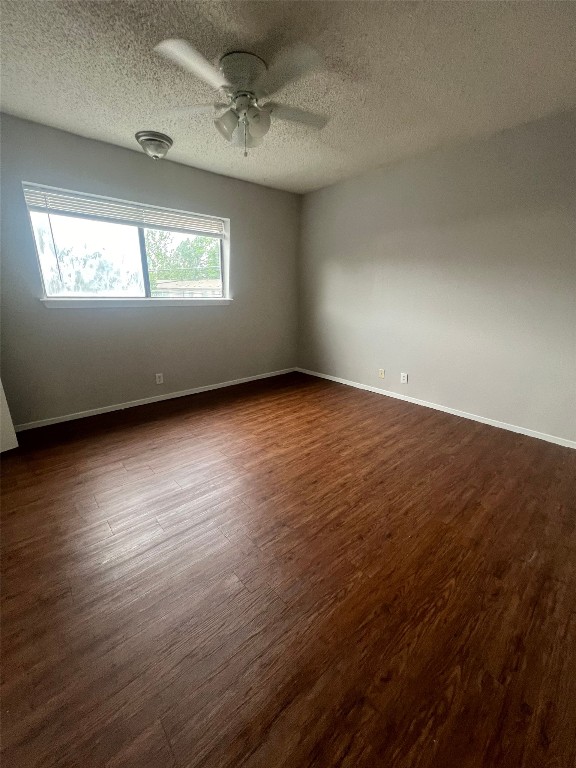 311 East 31st Street, Unit 308 Austin, TX 78705 - Photo 22 of 26 an empty room with wooden floor and windows