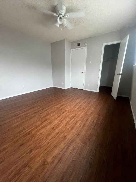 311 East 31st Street, Unit 308 Austin, TX 78705 - Photo 25 of 26 an empty room with wooden floor and ceiling fan