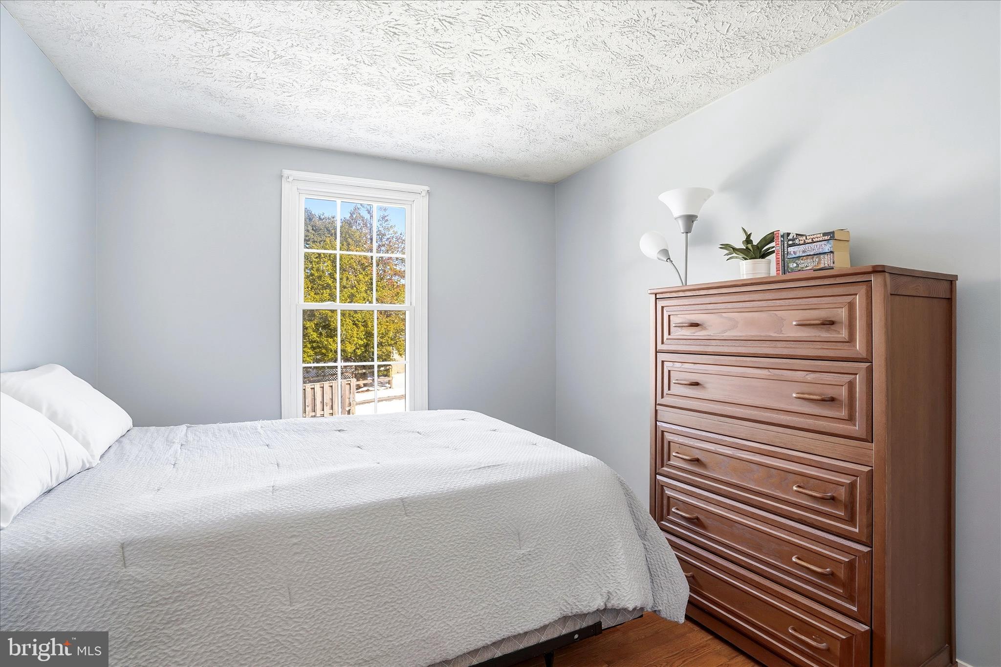 76 Hook Road Westminster, MD 21157 - Photo 20 of 38 a bedroom with a bed and cabinets