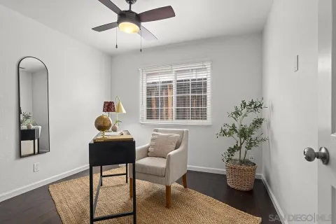 a view of a workspace with furniture