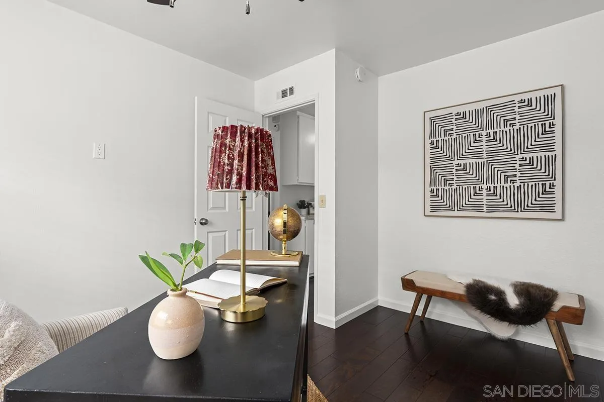 11394 Pegasus Avenue San Diego, CA 92126 - Photo 28 of 46 a living room with furniture and wooden floor