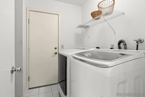 a view of a room with wooden walls