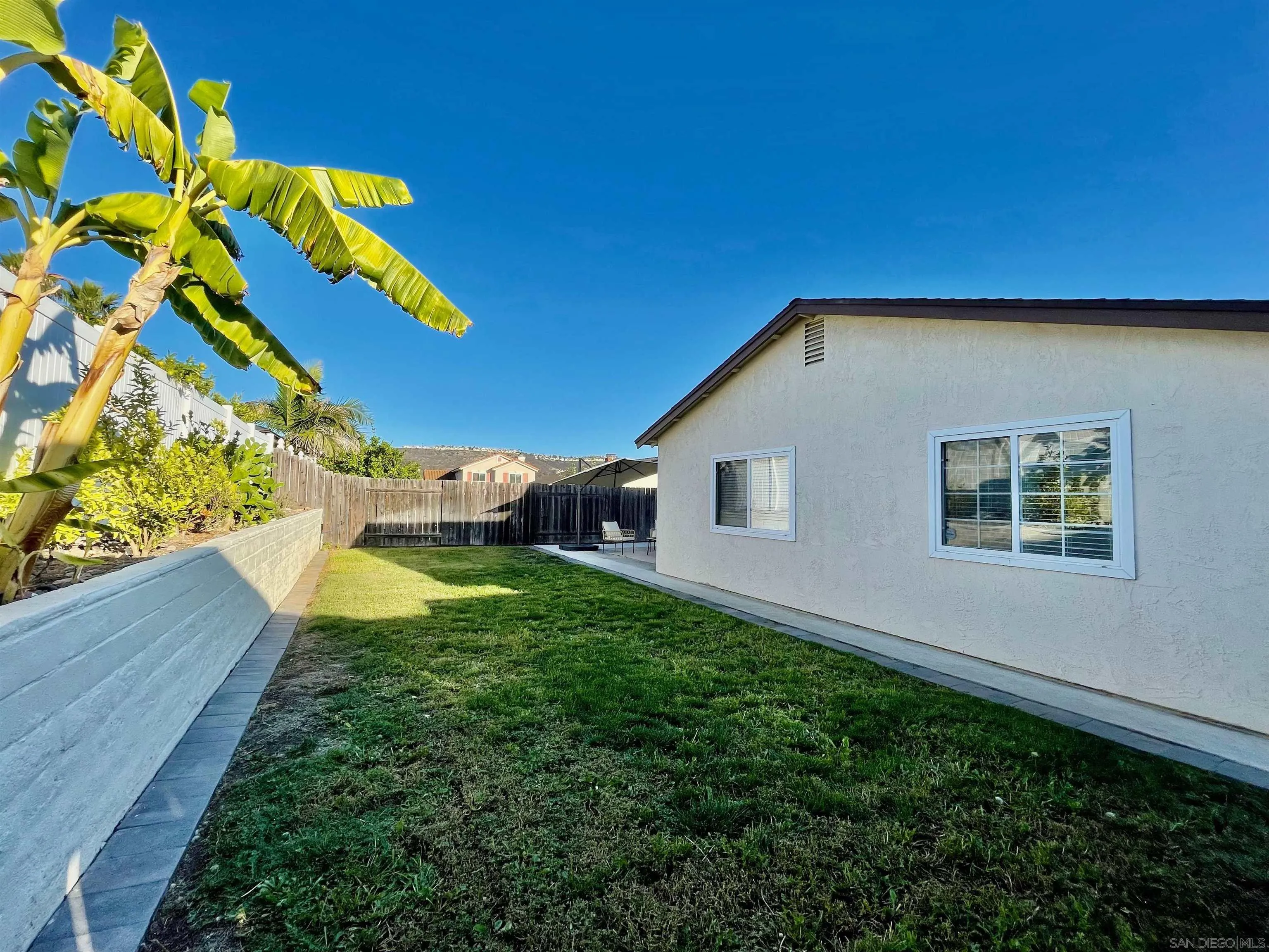 11394 Pegasus Avenue San Diego, CA 92126 - Photo 43 of 46 a house view with a backyard space