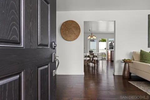 a view of living room and kitchen with furniture