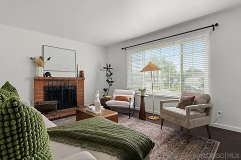 a bedroom with a bed and a fireplace