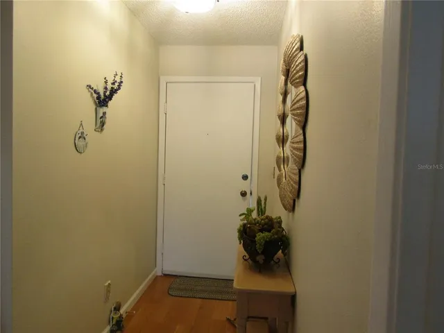 a bathroom with a shower and a sink