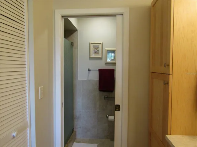 a bathroom with a sink and mirror