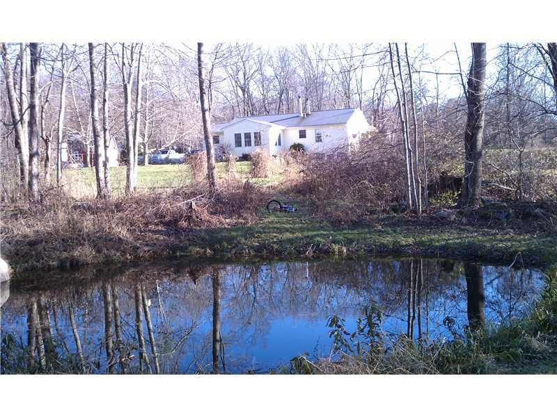 104 South Killingly Road Foster, RI 02825 - Photo 7 of 14 Exterior Back. Pond in back