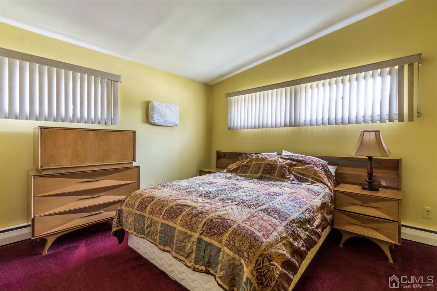 27 Mill Road Edison, NJ 08817 - Photo 14 of 31 a bedroom with a bed and a window