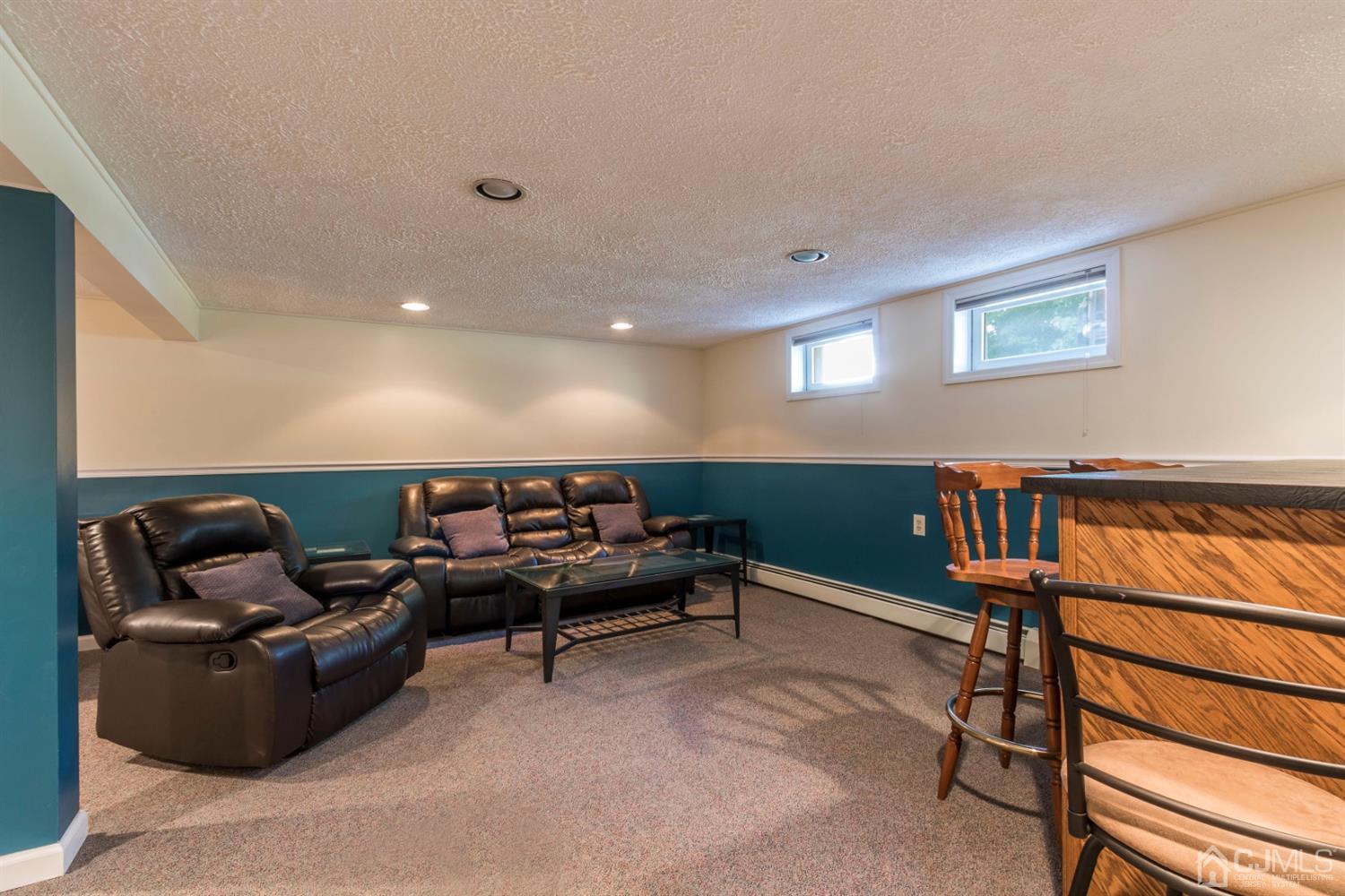 27 Mill Road Edison, NJ 08817 - Photo 21 of 31 a living room with furniture