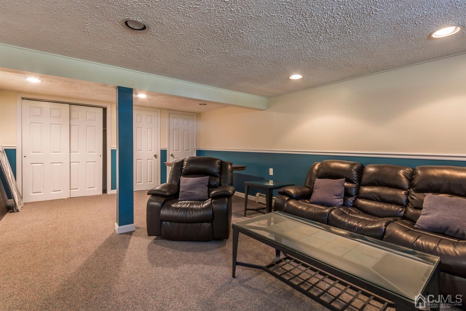 27 Mill Road Edison, NJ 08817 - Photo 24 of 31 a living room with furniture