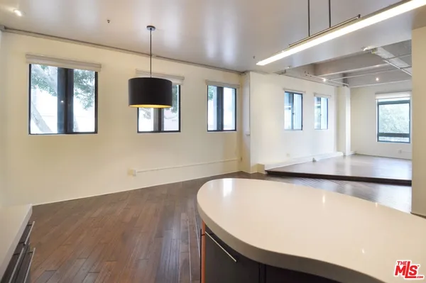 a view of a big room with wooden floor
