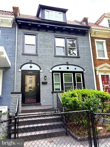 a front view of a house with windows