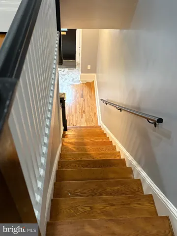 a kitchen with granite countertop cabinets and stainless steel appliances